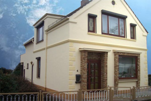 Haus mit Fassadenbeschichtung